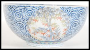An 18th Century Japanese Imari bowl having hand pa