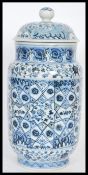 A Chinese hand painted blue and white ceramic vase