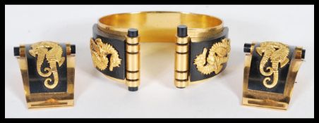 A rare French 20th Century Jean Painleve gold tone metal seahorse jewellery with bakelite panels