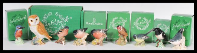 A collection of 20th century Beswick bird porcelain figurines to include nuthatch 2413, bullfinch