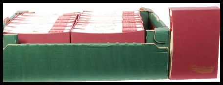 Sixteen volumes of the London Folio Society 1987 Charles Dickens books to include Oliver Twist,