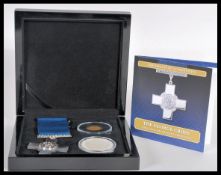 The George Cross Gold and Silver Matt Proof Coin Set - A Bradford Exchange coin set featuring a