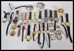 A collection of 20th Century and contemporary wrist watches to include ladies and gents examples