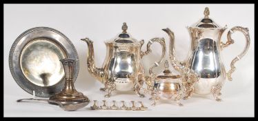 A collection of silver plate wares to include a 20th Century tea service consisting of coffee pot,