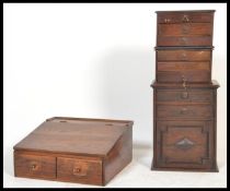 A group of early 20th Century industrial furniture to include a writing slope, pair of specimen