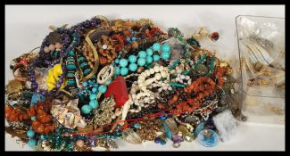 A collection of good vintage costume jewellery to include amber, coral, malachite, shell, pearl