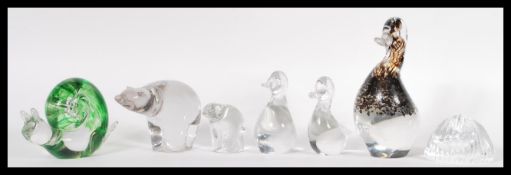 A collection pof studio glass paperweights modelled as animals and birds to include a large duck,