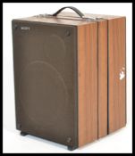 A vintage 20th Century Sony Corp portable tapecorder model TC-133CS with dual speakers, the faux