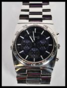 A vintage retro 20th Century Ingersoll duo double sided triple calendar chronograph watch set to a