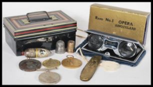 A collection of early 20th Century items to include a WWI first world war victory medal, a WWII