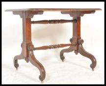 A fantastic 19th Century William IV mahogany table raised on scrolled leg with brass castors. Two