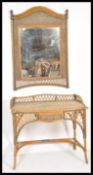 A 20th century retro ladies whicker weave dressing table and wall mirror. The wall hanging mirror
