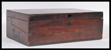 A pair of 20th century Chinese framed prints with geometric decorated borders having red central