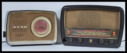 Two vintage radios - the first being a Phillips radio, the other being a Bush. Both in original