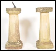 A pair of 20th Century matching well weathered garden stone sundial and bird bath raised on tall