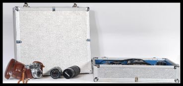 A collection of film camera equipment to include Olympus OM10, Minolta, SR T101, Pentax Asahi,