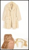 A vintage 20th Century ladies full length fur coat together with vintage fur stoles.