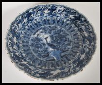 A 19th Century Delft display / serving plate of ro