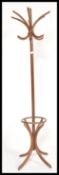A mid century Thonet bentwood hatstand. Raised on splayed legs with bentwood shaped hooks atop.