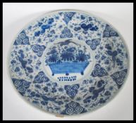 A 19th Century Delft display / serving plate of ro