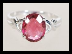 A hallmarked 18ct white gold ring prong set with a