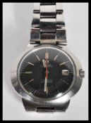 A vintage Omega Geneve Dynamic automatic gentleman's wrist watch, having a black dial with a