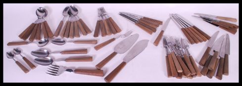 A collection of retro 20th Century Danish inspired teak handles cutlery /  consisting of knives,