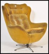 A vintage retro 20th century 1960's Parker Knoll / G-Plan large batwing swivel egg chair -