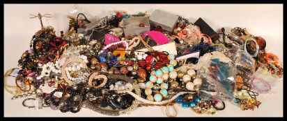 A very large collection of vintage costume jewellery to include a large selection of beaded
