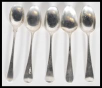 A group of five 18th century George lll silver hallmarked teaspoons. Three being Hanoverian in