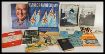 A selection of early to mid 20th Century military and transport ephemera to include a selection of