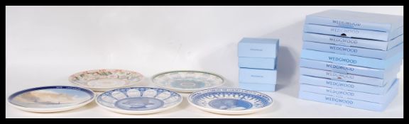 A collection of Wedgwood collectors plates complete in the original boxes to include calendar