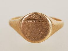 A 18ct gold gentleman's signet ring with plain cartouche front, size L and 1.9g
