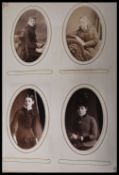 Two early 20th Century Edwardian photograph albums containing to include several family portrait