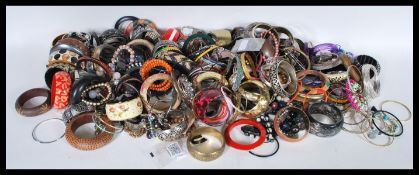 A very large collection of vintage costume jewellery to include bracelets, bangles, beads, made of