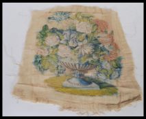 An 19th Century Victorian floral still life needlepoint very finely embroidered onto muslin, the