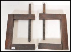 A pair of antique 19th Century wooden cabinet makers clamps with impressed makers marks for Parry of