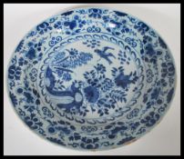 A 19th Century Delft display / serving plate of ro