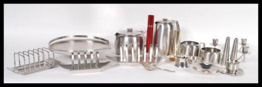A collection of vintage Old Hall stainless steel wares dating to the mid 20th century to include