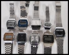 A collection of late 20th Century vintage retro Casio type digital watches on stainless steel