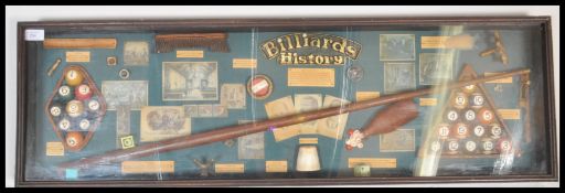 A large vintage framed and glazed shadow box cabinet containing a display of The History Of