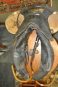 A large 19th Century Victorian leather working horse collar haim together with a pair of 19th