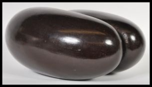 Natural History - A polished Coco de mer being dark in colour and uncarved. A large complete nut,