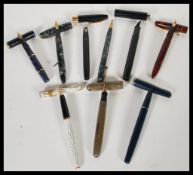 A collection of vintage 20th Century fountain / ink pens to include Parker, Conway Stewart,