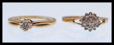 A hallmarked 9ct gold solitaire ring set with a brilliant cut white stone with engraved shoulders (