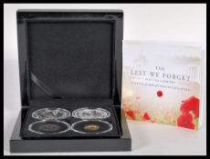The Lest We Forget Prestige Gold Coin Set - A Bradford Exchange military interest WWI three coin set