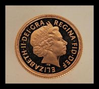 A 22ct gold half sovereign dated 1999 with George and the dragon to one side and Elizabeth II facing