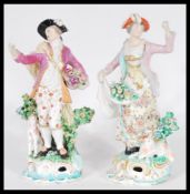 Two 18th Century Derby china figurines in the manner of Sitzendorf to include a figure of a woman