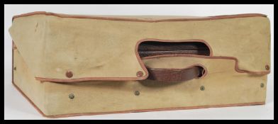 A vintage mid 20th Century vanity set within a leather case with a pink satin interior having