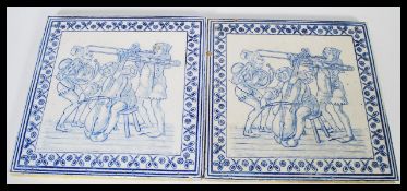 A pair of 19th Century Victorian blue and white transfer printed floor tiles by E Smith depicting